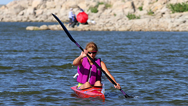 Image of a woman kayaking. Photo courtesy: Colorado Parks and Wildlife